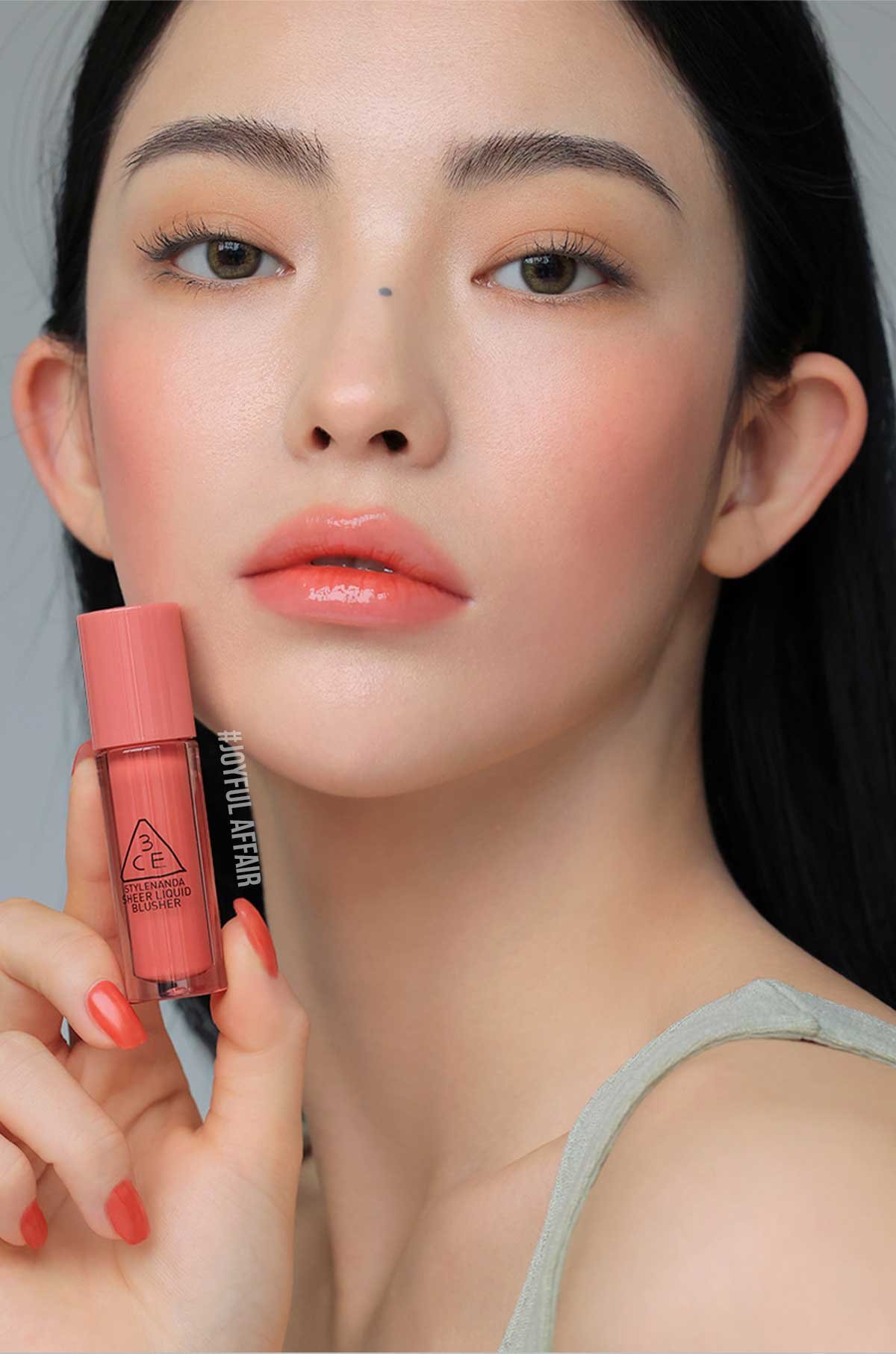 model visual of 3CE Sheer Liquid Blusher joyful affair shade 