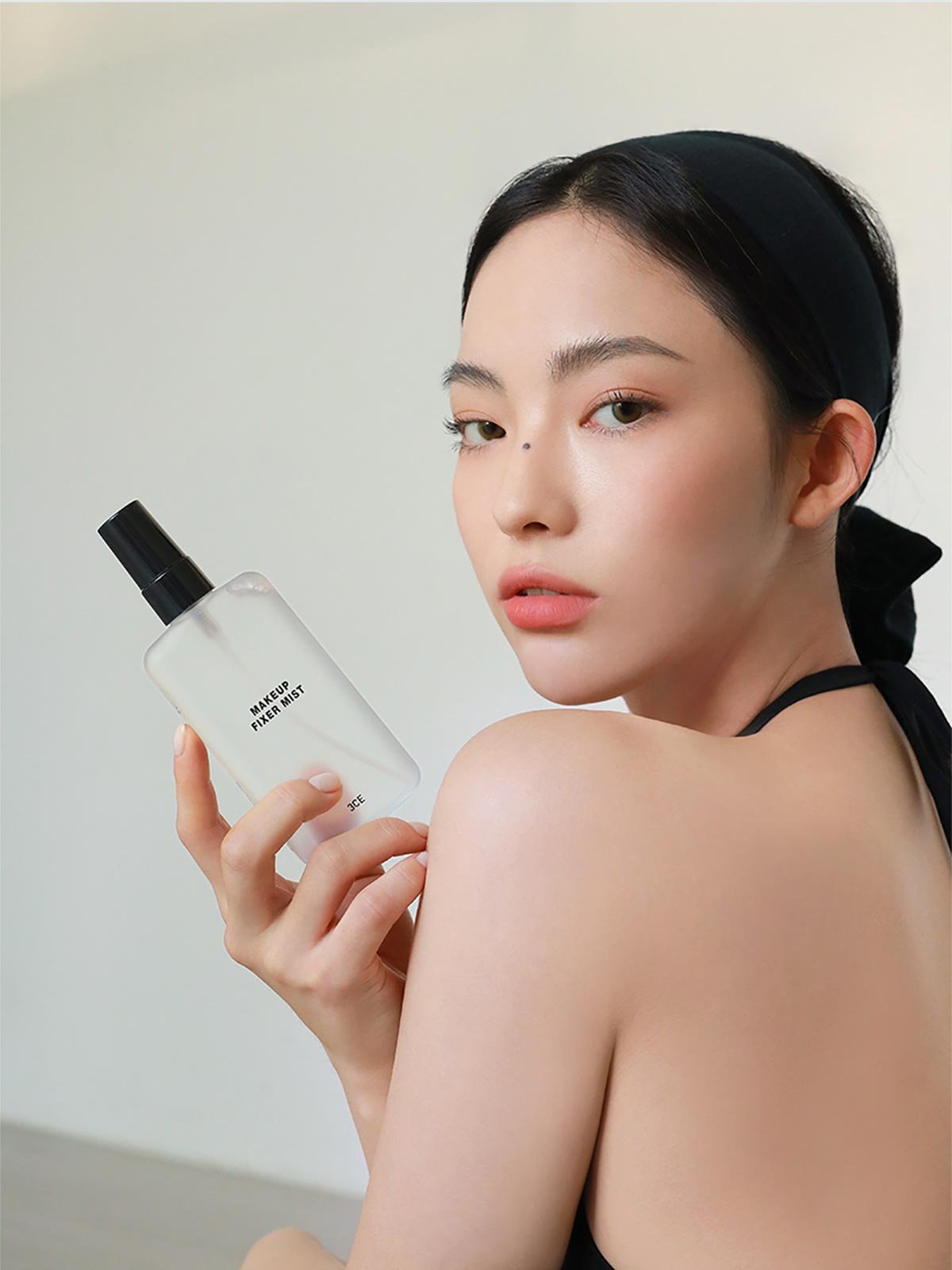 model visual of 3CE Make up Fixer Mist